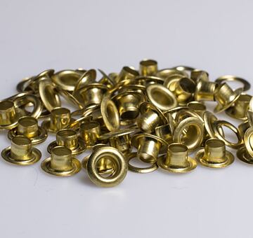 Grommets, gold