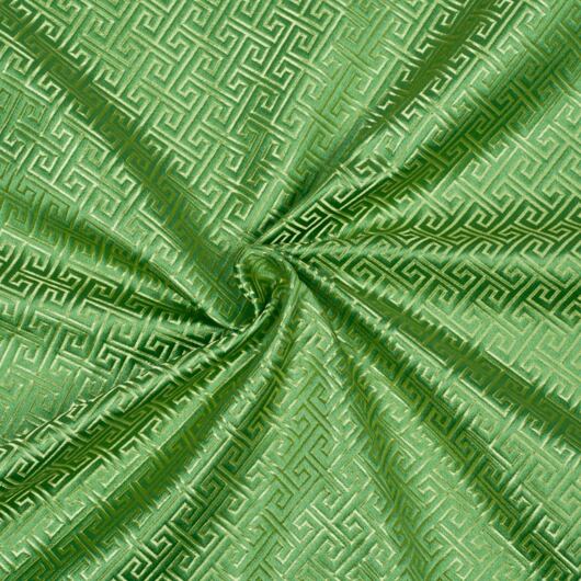 Geometric brocade fabric, green and gold