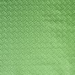 Geometric brocade fabric, green and gold